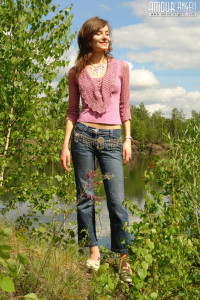 Girl pulling off her jeans