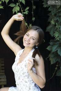 Teen on wooden stairs