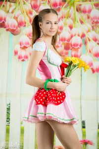 Teen model takes off lovely dress