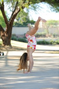 Tara does a flip in the park