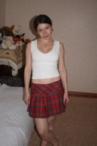 Kandy in her short red Tartan Skirt