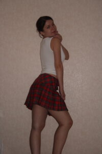 Kandy in her short red Tartan Skirt