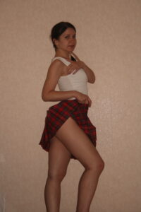 Kandy in her short red Tartan Skirt