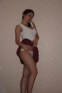 Kandy in her short red Tartan Skirt