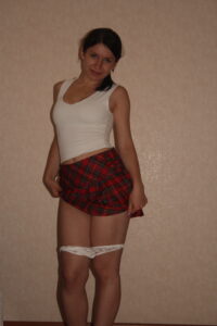 Kandy in her short red Tartan Skirt