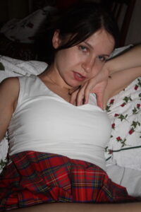 Kandy in her short red Tartan Skirt